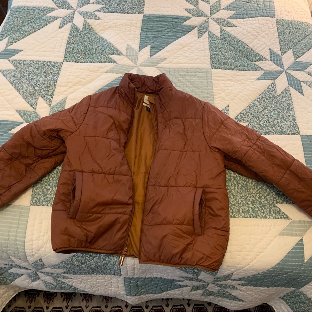 target universal thread rust orange puffer cropped
